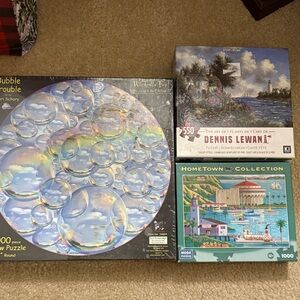 Two new puzzles with tags, one used. All for one price